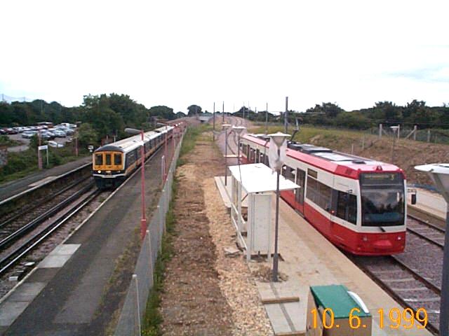 Train and Tram at Mitcham Junction
